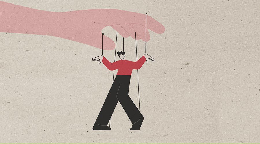 Psykologisk manipulation og gaslighting illustreret ved en stor hånd, der styrer en mand som en marionetdukke.